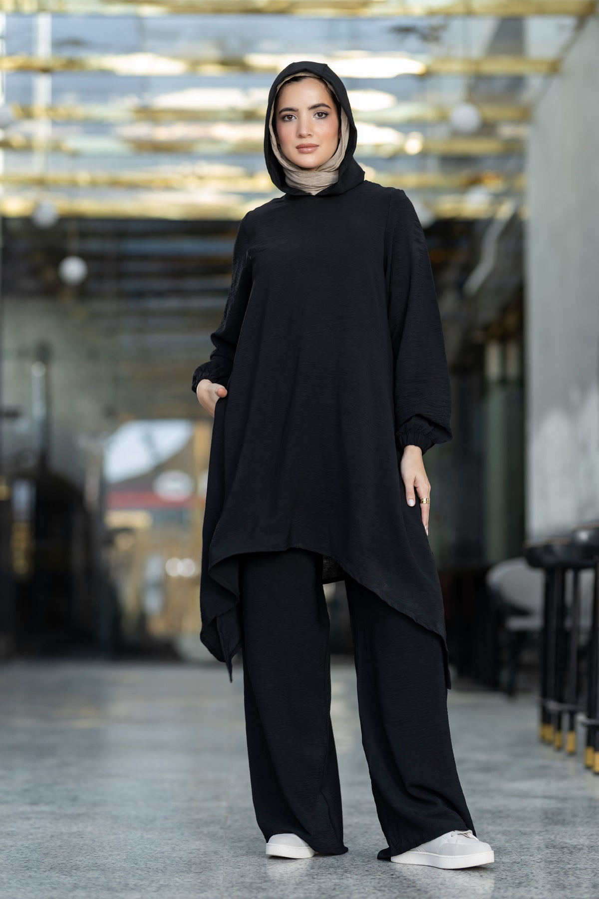 Modest suit with long top and wide pants