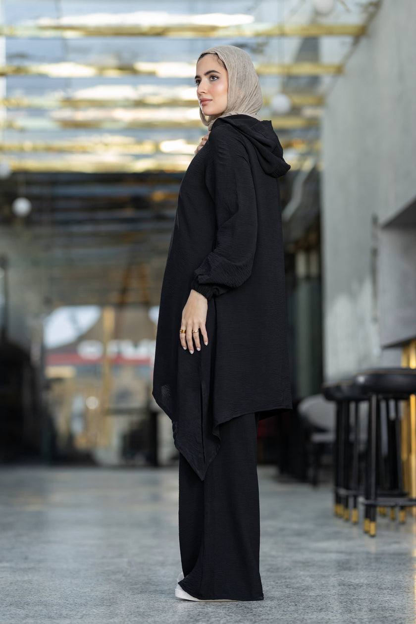 Modest suit with long top and wide pants